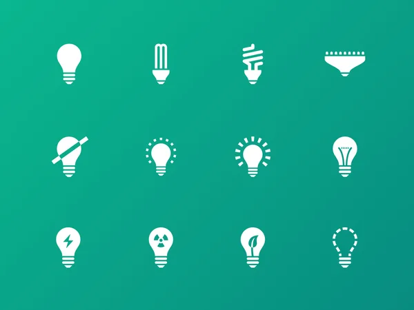 Light bulb and CFL lamp icons on green background. — Stock Vector