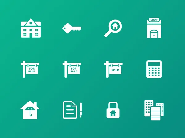 Iconos inmobiliarios sobre fondo verde . — Vector de stock