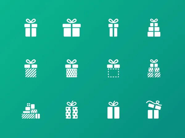 Present icons on green background. — Stock Vector