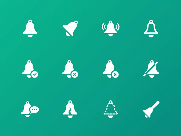 Alarm bell ikoner på grön bakgrund. — Stock vektor
