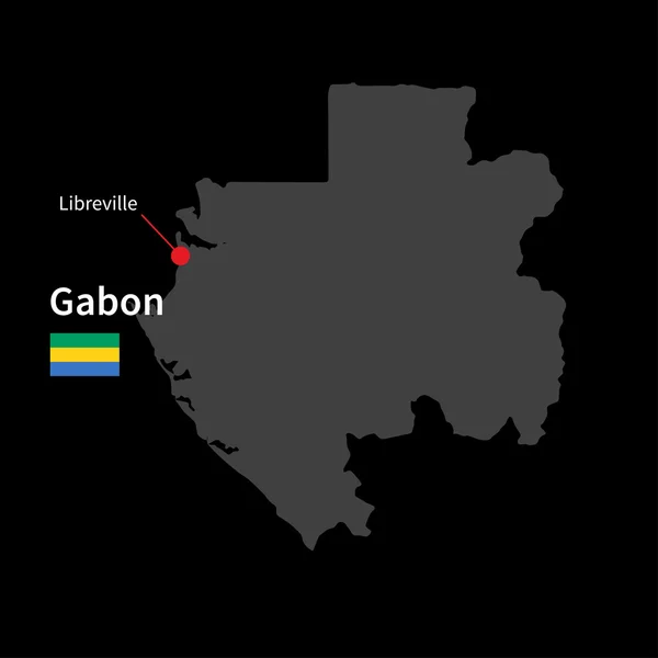 Detailed map of Gabon and capital city Libreville with flag on black background — Stockvector