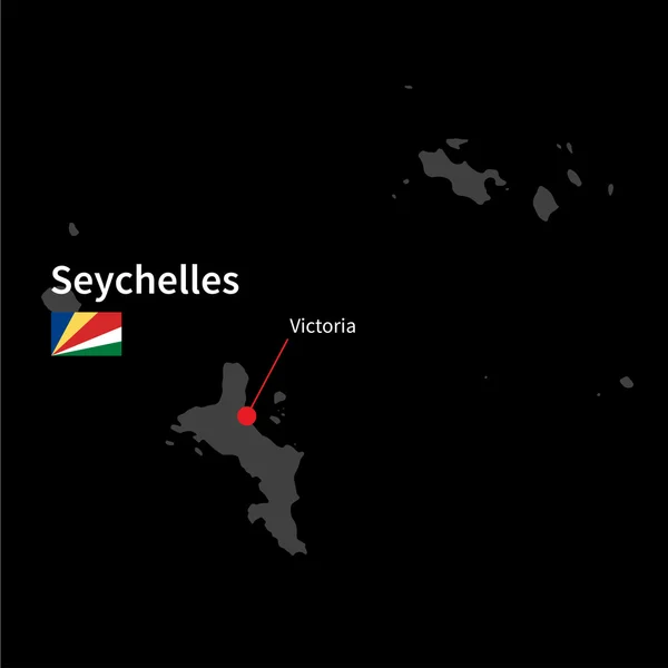 Mapa detallado de Seychelles y capital Victoria con la bandera sobre el fondo negro — Vector de stock