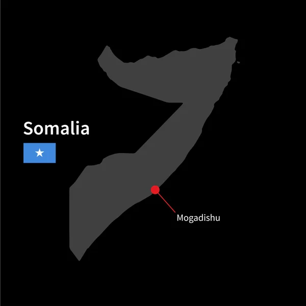 Mapa detallado de Somalia y capital Mogadiscio con la bandera sobre el fondo negro — Vector de stock