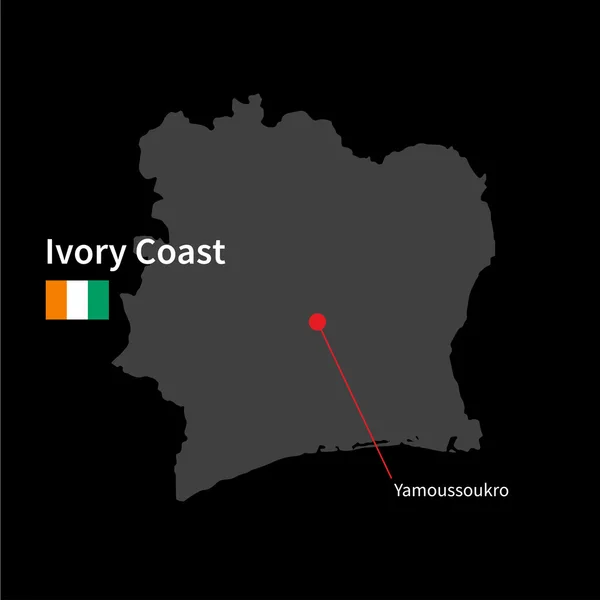 Detaljerad karta över Elfenbenskusten och huvudstad Yamoussoukro med flagga på svart bakgrund — Stock vektor