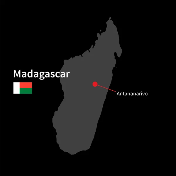 Detailed map of Madagascar and capital city Antananarivo with flag on black background — Stock Vector