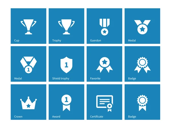 Iconos de premios sobre fondo azul . — Vector de stock