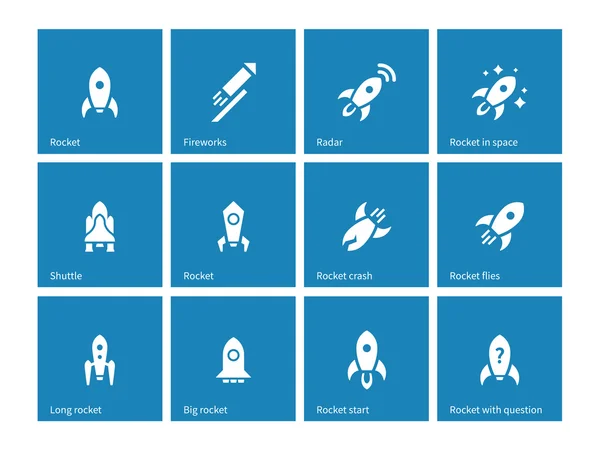 Plana raket ikoner på blå bakgrund. — Stock vektor