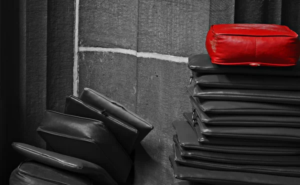 Red cushion on top of the pile — Stock Photo, Image