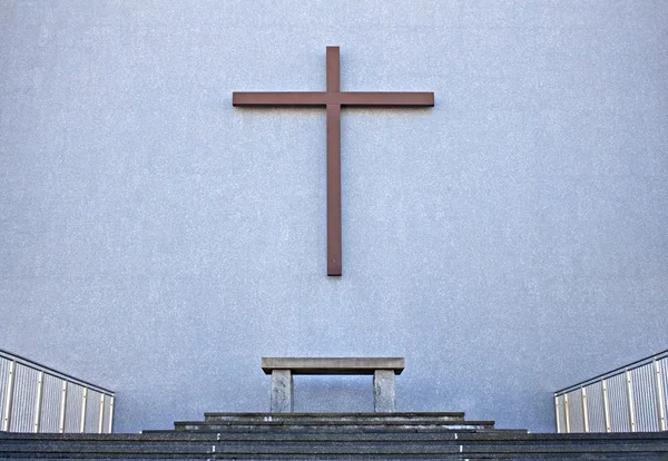 Cross on exterior wall of Cathedral — Stock Photo, Image