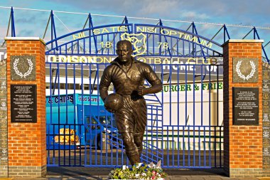 LIVERPOOL UK JANUARY 8TH 2016. Dixie Dean statue and Wall of Fam clipart