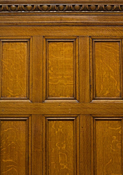 Beautiful antique solid oak panelling with egg and dart cornice — Stock Photo, Image