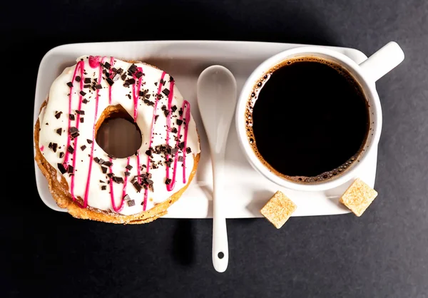 Donut e xícara de café. Vista superior — Fotografia de Stock