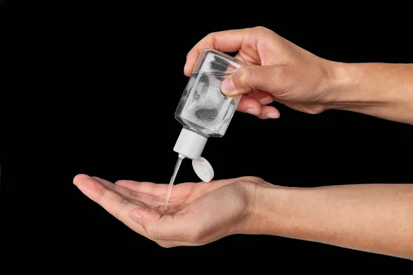 Portable small hand sanitizer bottle. Woman using to go dispenser for clean hands while commuting or shopping — Stock Photo, Image