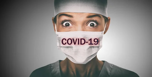 Covid-19 coronavirus text written over doctor surgical face mask Asian woman hospital worked scared shocked by Corona virus pandemic worried. Title on background — Stock Photo, Image