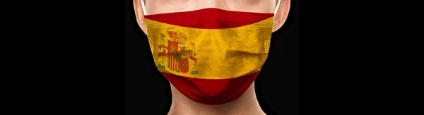 Spania pavilion doctor masca fundal banner pentru conceptul COVID-19 Coronavirus. Izolat pe negru — Fotografie, imagine de stoc