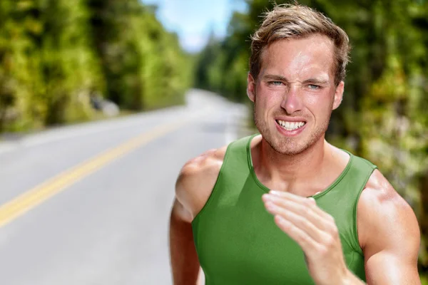 Athlete runner on intense cardio running workout — Stock Photo, Image