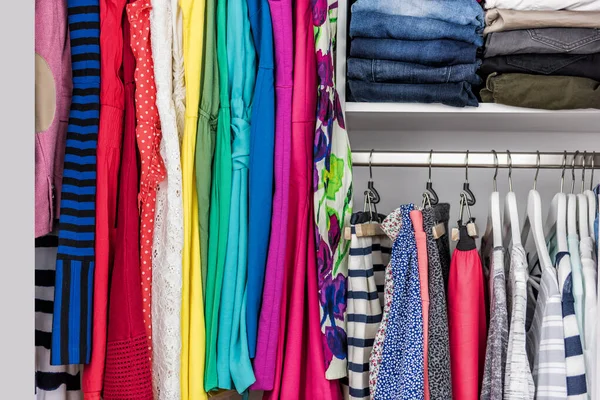 Organized home clothing closet or shopping display