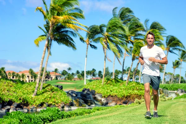 Active lifestyle happy runner man jogging in park — Stock Photo, Image