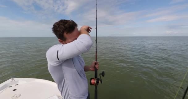 Fishing - tired exhausted proud sport fishing man after shark fishing fight — Stock Video