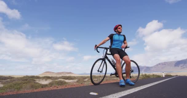 Cyclist biking on road race cycling restring on racing bike — Stock Video