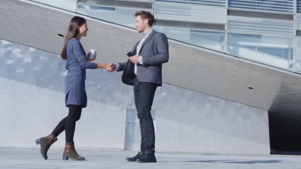 Handshake - business people shaking hands, business man and business woman — Stock Video