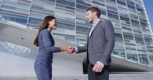 Business Handshake - business people shake hands, business man and woman — Stock video