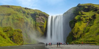 Iceland waterfall Skogafoss in Icelandic nature landscape - long exposure clipart