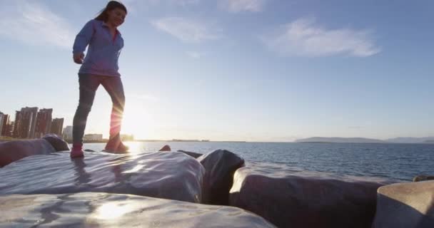 Reykjavik Iceland waterfront harbor - woman walking on promenade on summer day — Stock video