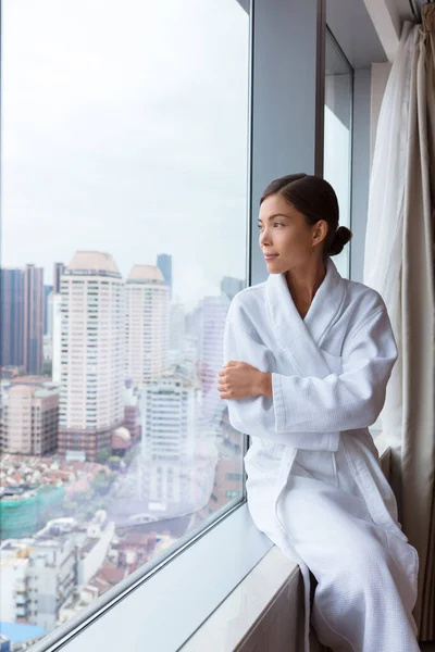 Spa woman relaxing at hotel room window — Stok fotoğraf