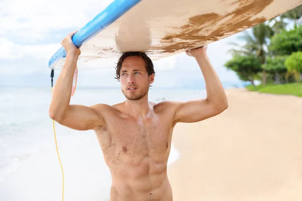 Sexy surfer man holding surf board after surfing — Stock Photo, Image