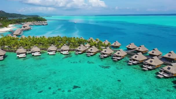 Beach Travel resort vacation aerial video with overwater bungalows in coral reef — Stock Video