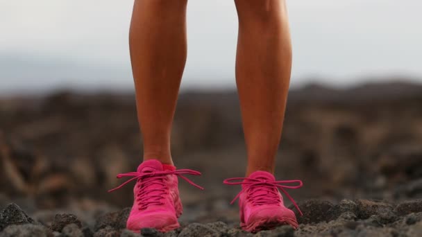 Running woman tying shoe laces going running - girl trail runner — Stock Video