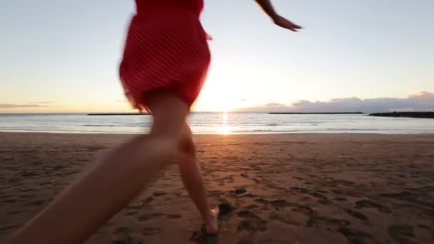 Woman running to water — Stock Video