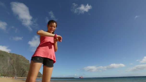 Woman running on the beach — Stock Video