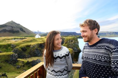 Couple on romantic travel on Iceland clipart