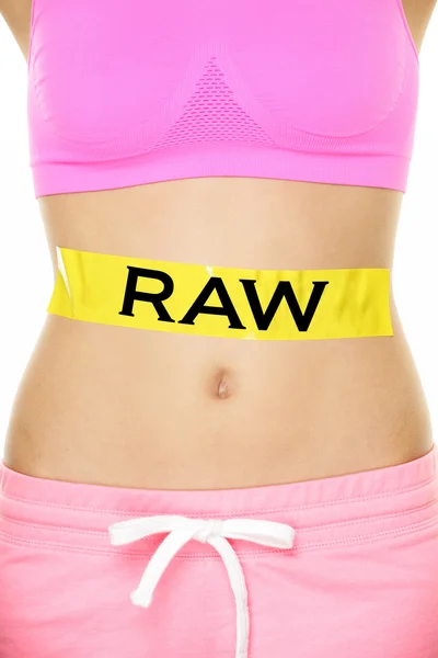 Woman's stomach eating only raw ingredients — Stock Photo, Image