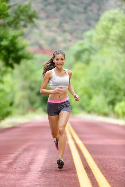 Corridore donna corsa formazione — Foto Stock