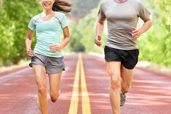 Běžci na běhu školení během cvičení fitness — Stock fotografie