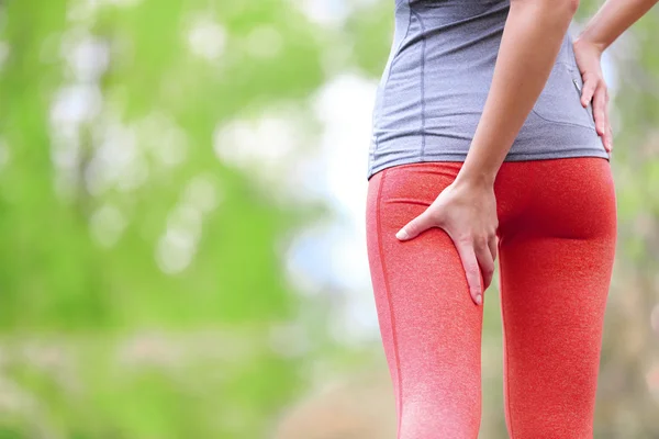 Female runner with running sports injury — Stock Image Female runner with running sports injury Stock Photo