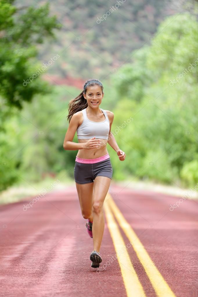 Fitness woman runner running on summer park in the morning Stock Photo by  lzf