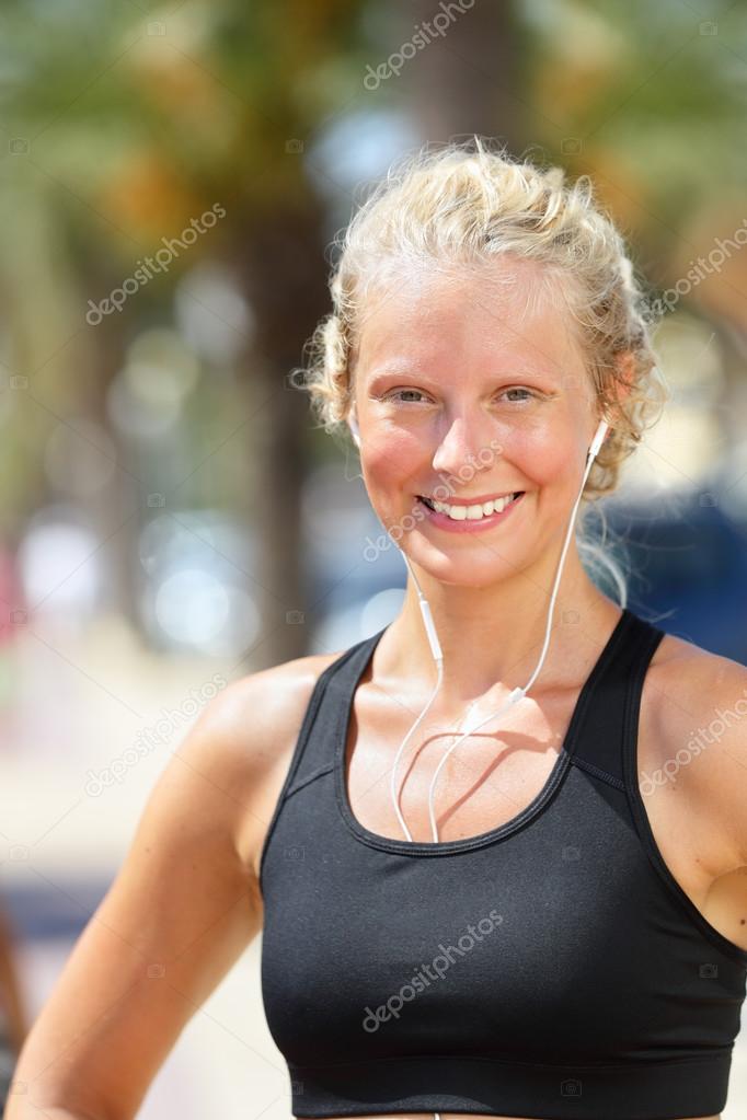 Confident Sporty Woman Flexing Muscles On Beach. Beautiful Young