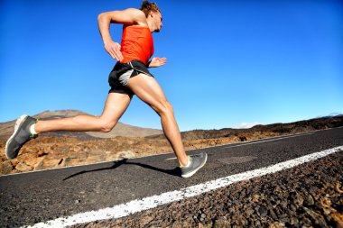 Male athlete runner training at fast speed clipart
