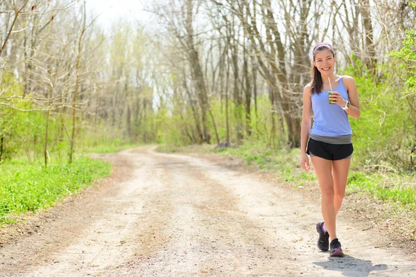 Woman runner drinking smoothie — Stock Photo, Image