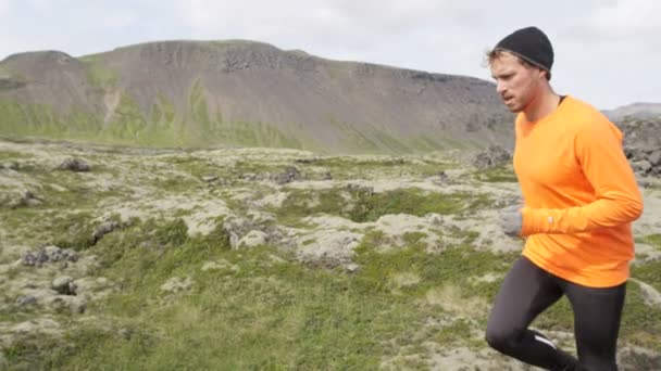 Woman and man runners jogging outdoors — Stock Video