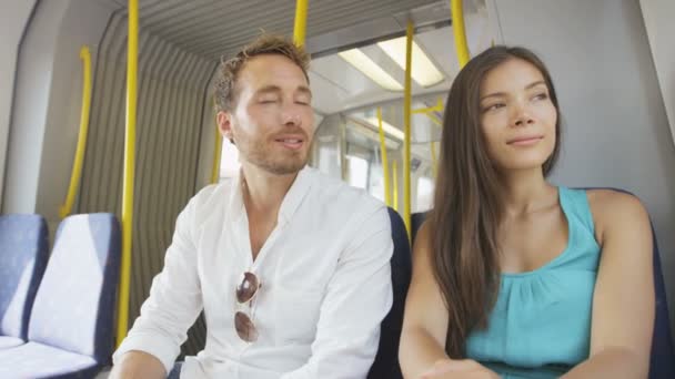 Viajeros sentados en el transporte sonriendo — Vídeos de Stock