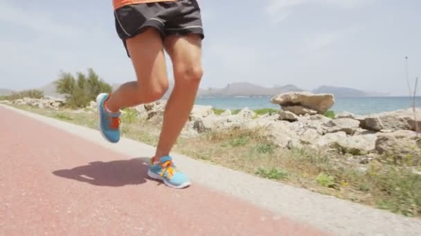 Runner feet running on road — Stock Video