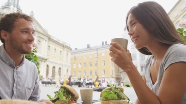 Couple eating food at Cafe in Stockholm — Stock Video