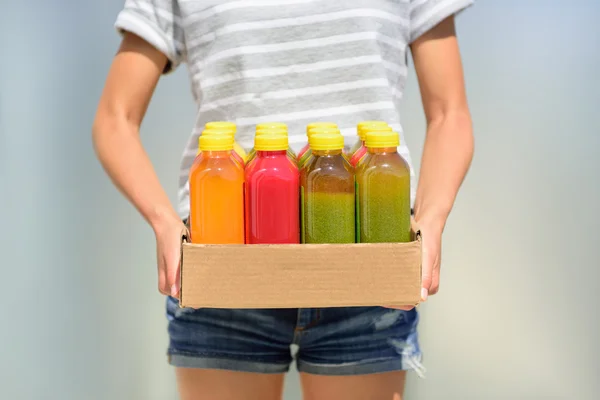 Woman holding delivery box — Stock Photo, Image