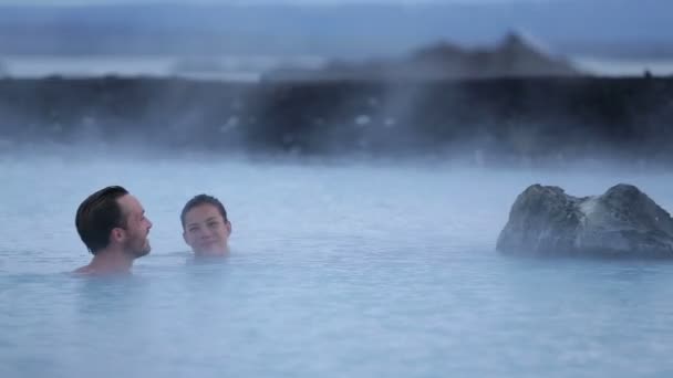 Couple in love relaxing in hot pool — Stock Video