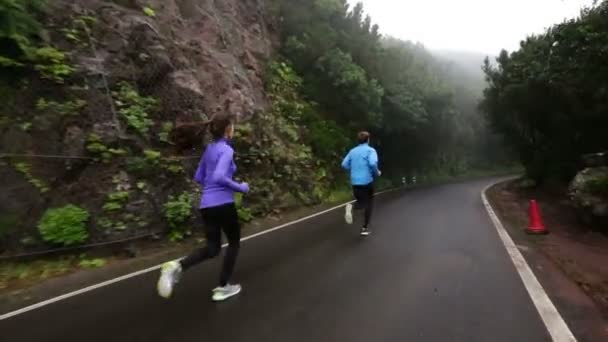 Fitness deporte pareja trotar — Vídeo de stock